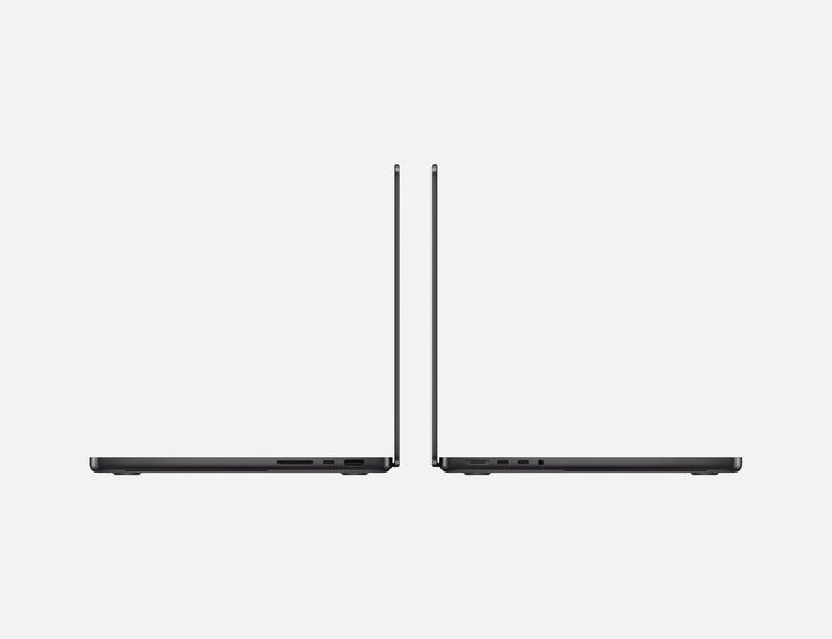 Side view of two sleek Apple 14-inch MacBook Pro M4 laptops facing each other on a white background