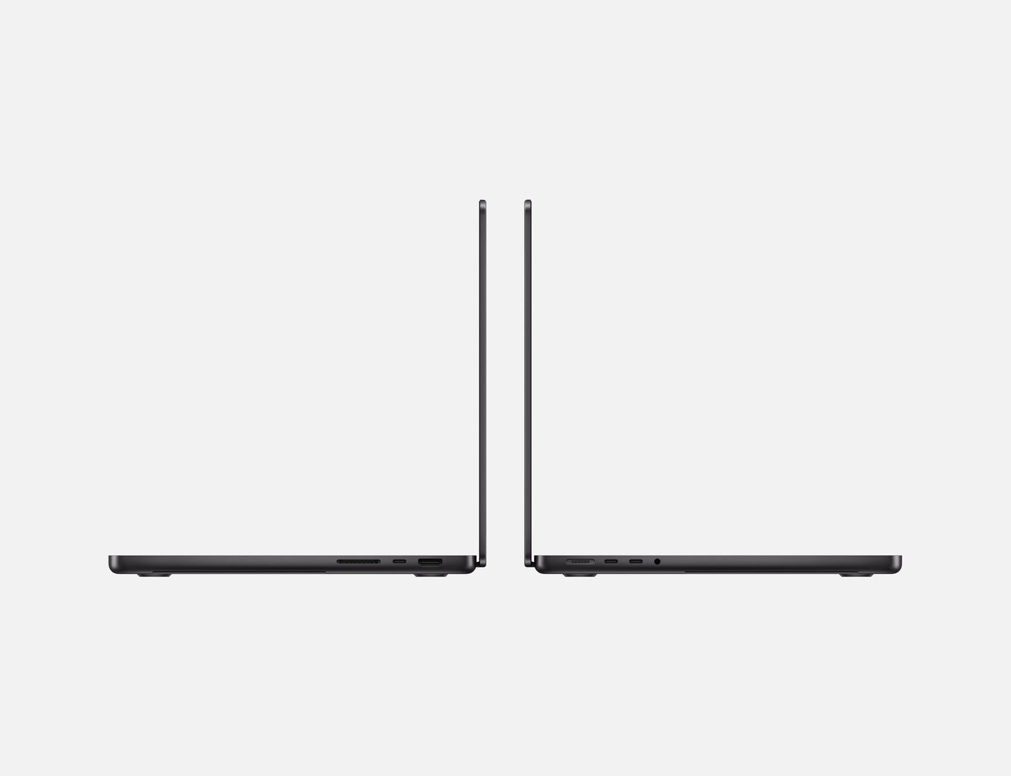 Side view of two sleek Apple 14-inch MacBook Pro M4 laptops facing each other on a white background