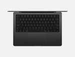 Top view of Apple 14-inch MacBook Pro M4 laptop keyboard and trackpad in space gray