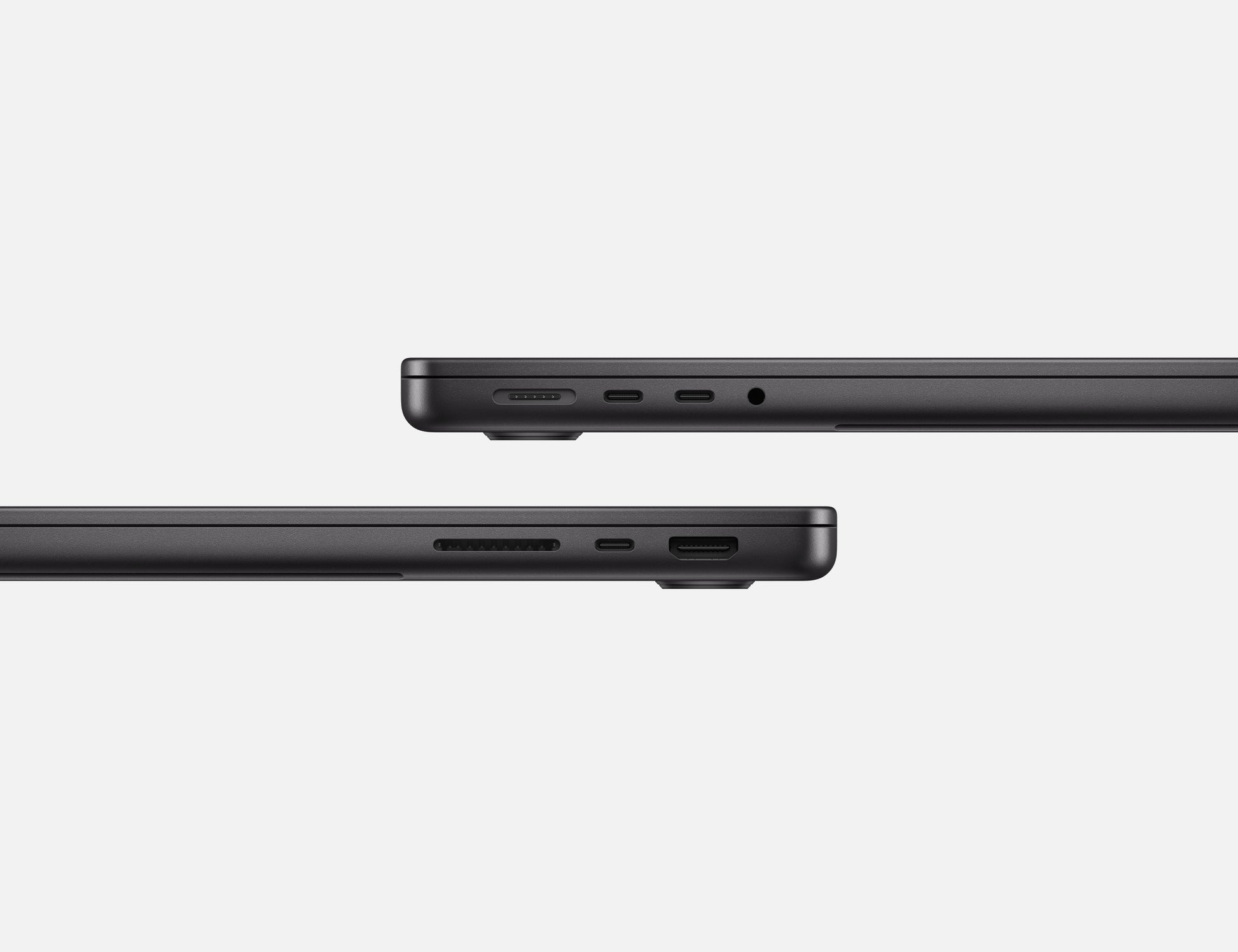 Side view of 14 inch MacBook Pro Space Black showing ports and slim profile
