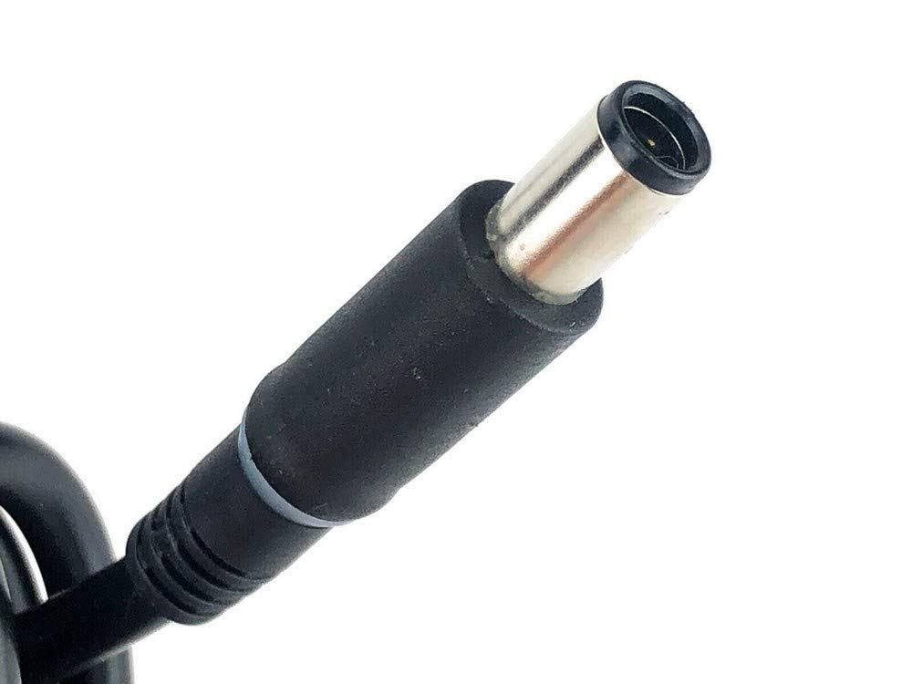 Close-up of Dell 130W power adapter round connector plug with black cable