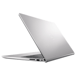 Silver Dell Inspiron 3520 laptop partially open showing slim aluminum chassis and side ports