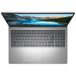 Top view of open Dell Inspiron 15 laptop showing full keyboard and high-resolution screen with mountain lake wallpaper