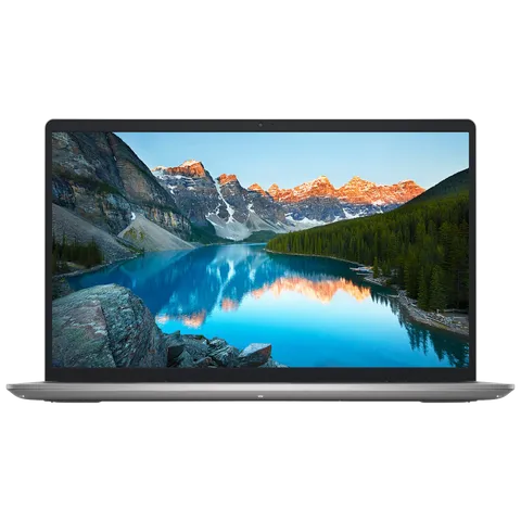 Dell Inspiron 3530 laptop with slim silver chassis and thin bezels showing mountain lake wallpaper