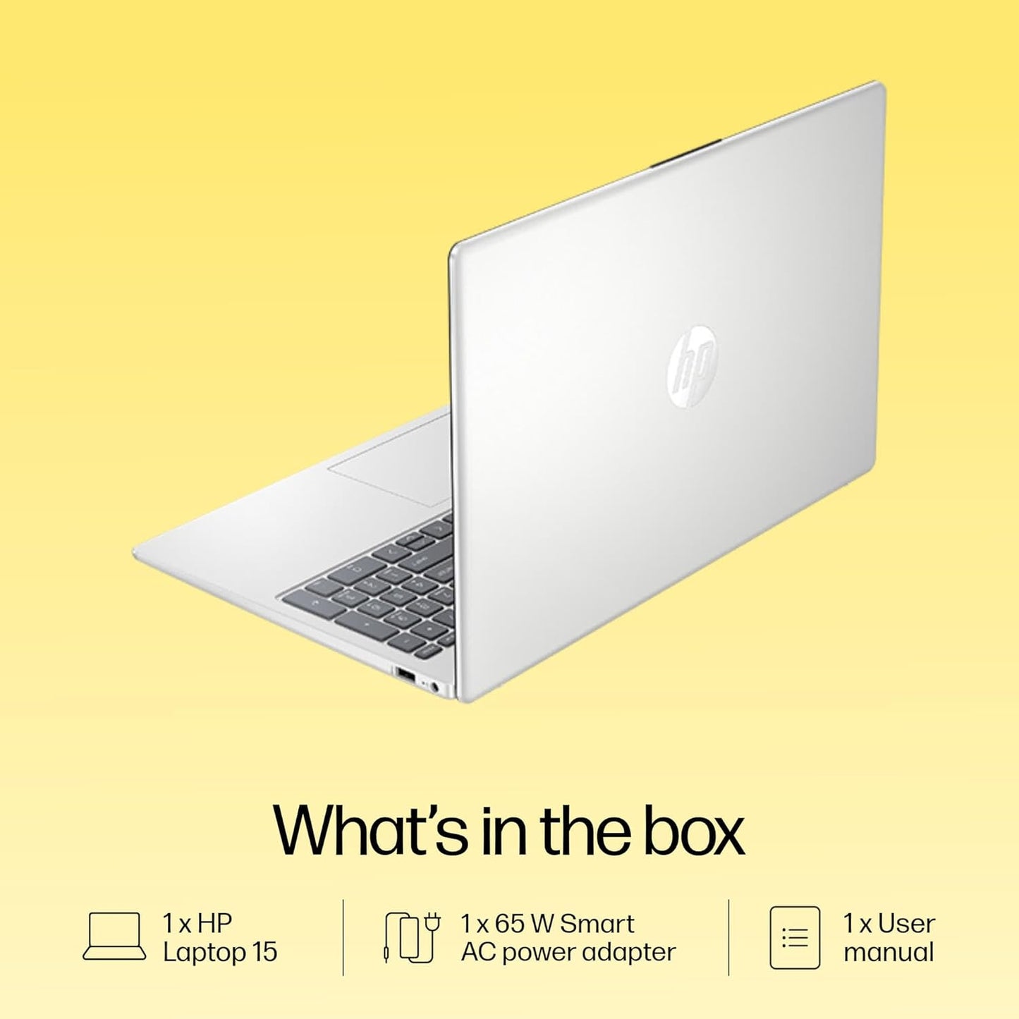 Silver HP 15 Ryzen 5 laptop partially open showing keyboard and sleek design on yellow background