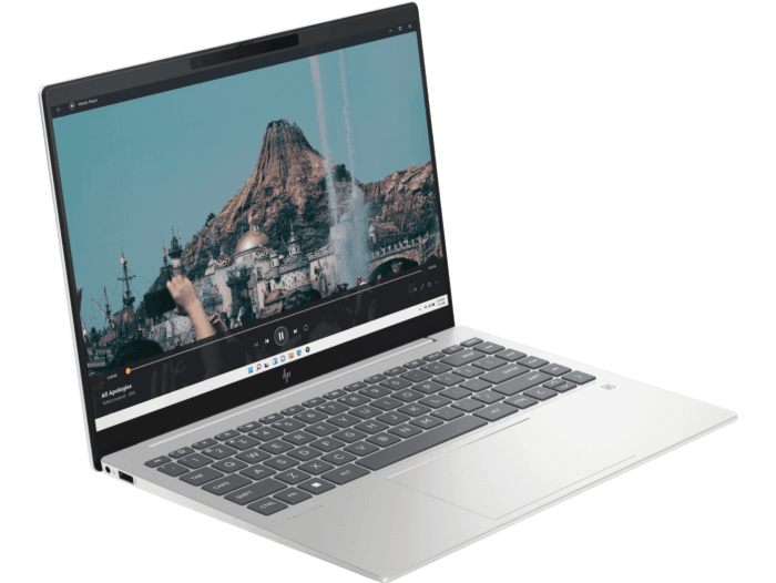 HP Pavilion Plus14 laptop i5-1335U in silver with a mountain scenic wallpaper on screen and full keyboard