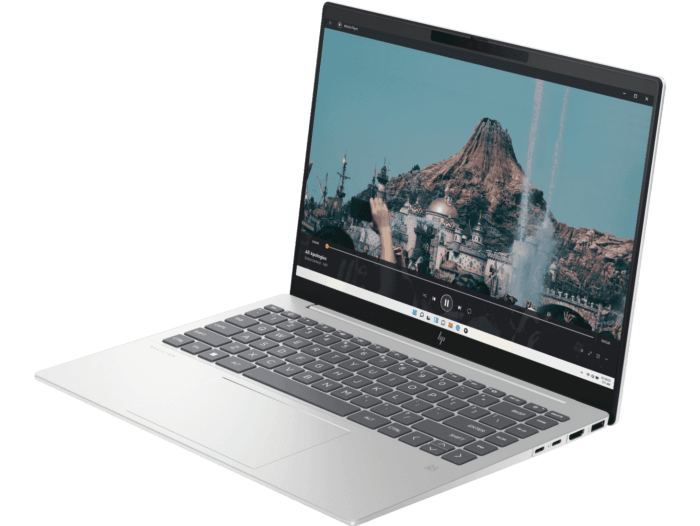 HP Pavilion Plus14 laptop i5-1335U with sleek silver design and vibrant display showing mountain scenery