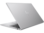 Sleek silver HP ZBook Firefly 16 G11 laptop partially open showing keyboard and ports