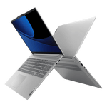 Sleek silver Lenovo Ideapad Slim 5i laptop open showing keyboard and screen with blue wallpaper