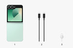 Samsung Galaxy Z Flip6 5G phone in green with charging cable and SIM ejector tool